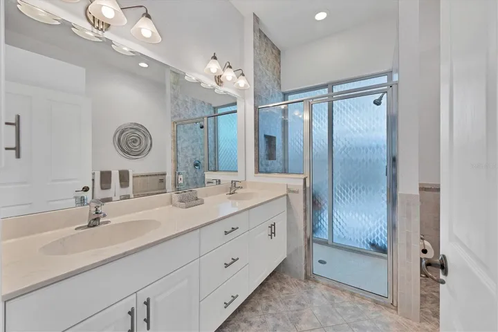 Guest Bath that leads to pool and lanai