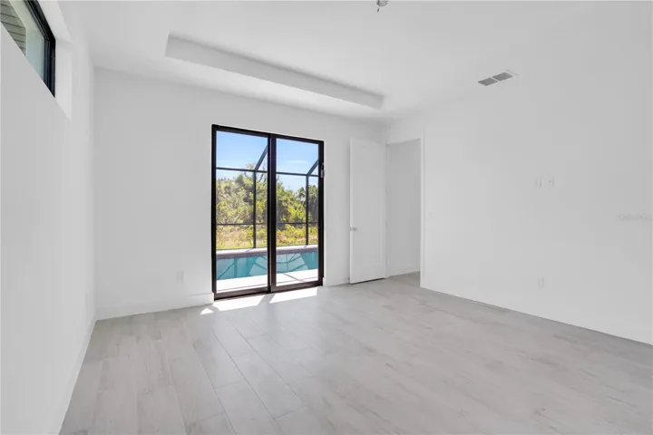 Master Bedroom with access to Pool