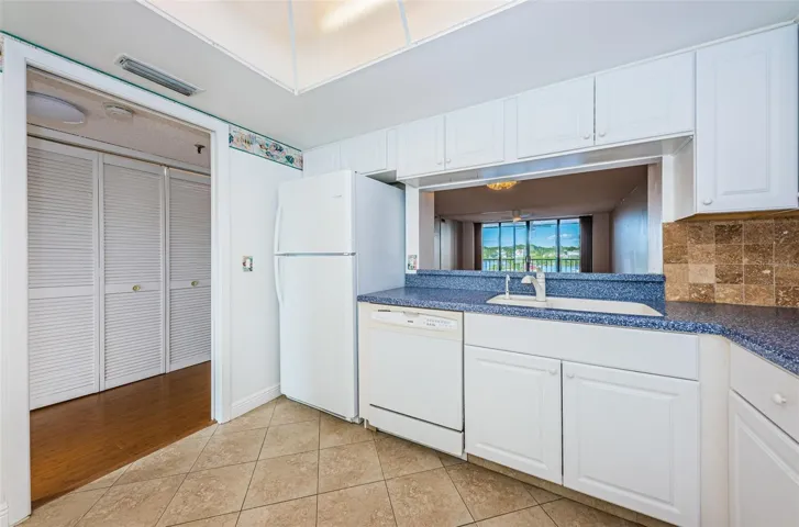 Kitchen with a pass through to the Dining area