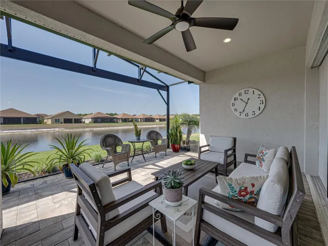 Expanded, screened veranda with outdoor kitchen