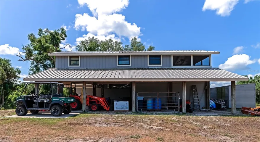 Side barn view used for storage but can be used for horse stalls