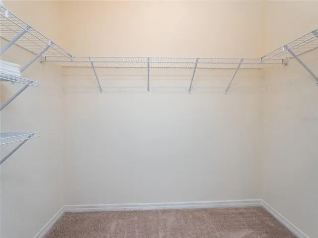 lager of the two primary walk-in closets