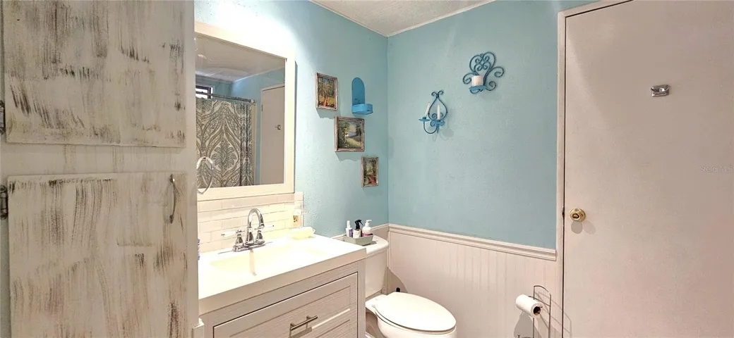 Guest bathroom includes walk-in shower