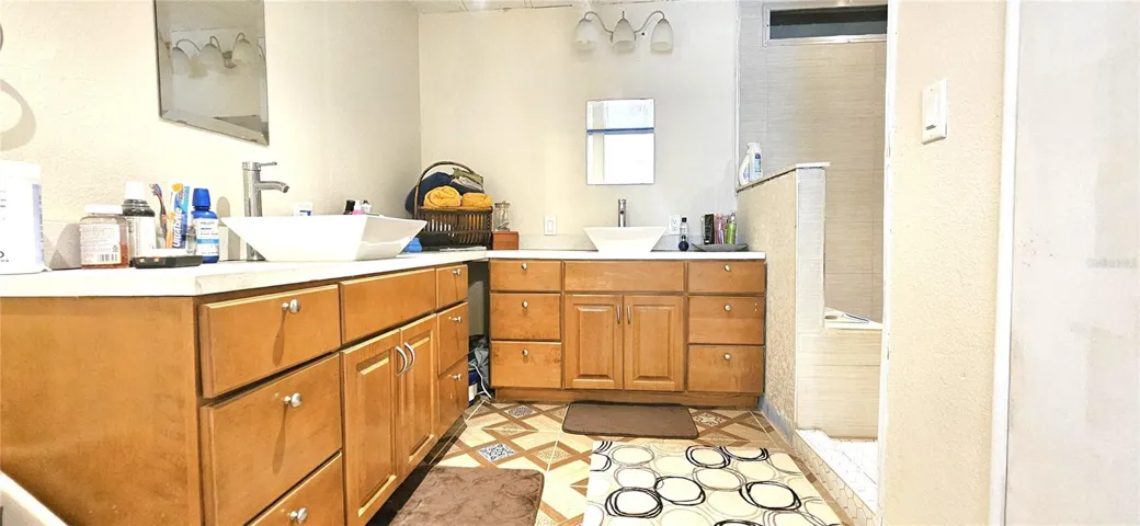 Master includes dual vanity, walk-in closet & fully tiled walk-in shower