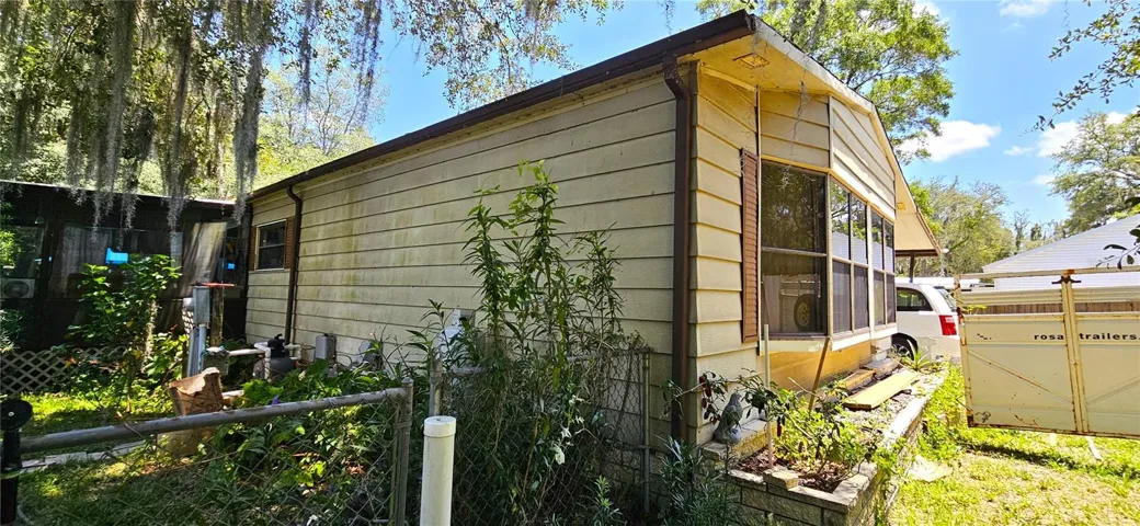 Main home 1380sf on half acre, well, septic, sewer, propane gas, electricity