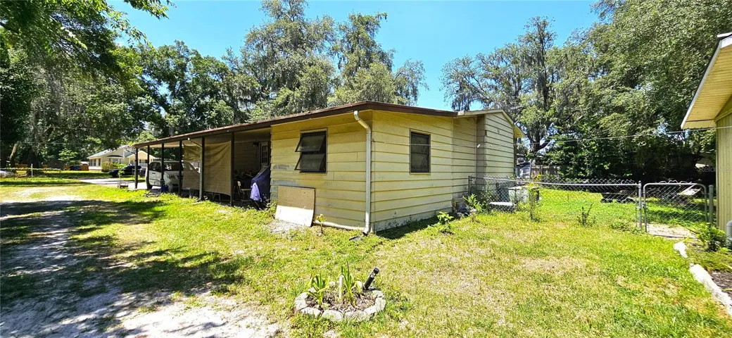 Main home 1380sf on half acre, well, septic, sewer, propane gas, electricity