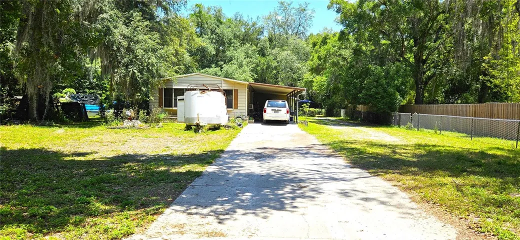 Main home 1380sf on half acre, well, septic, sewer, propane gas, electricity