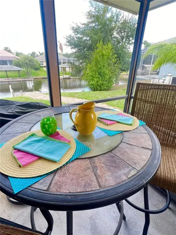 Screened Lanai overlooking Saltwater canal and dock