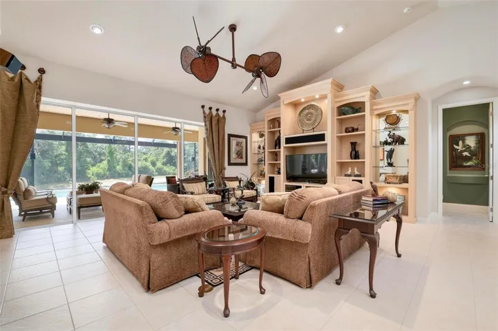Living room with sliders to lanai/pool