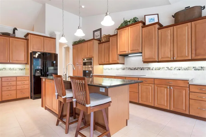 Kitchen has a plethora of cabinets