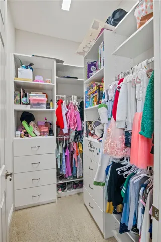 Bedroom 3 custom walkin closet.