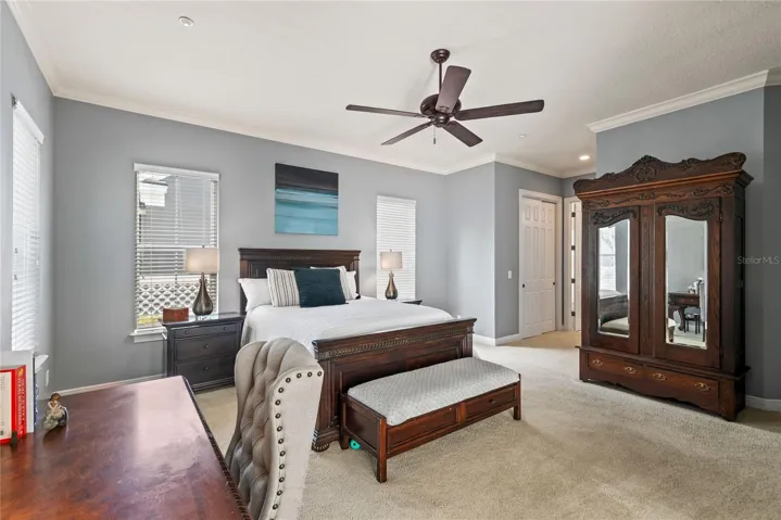 Primary bedroom with double closets.