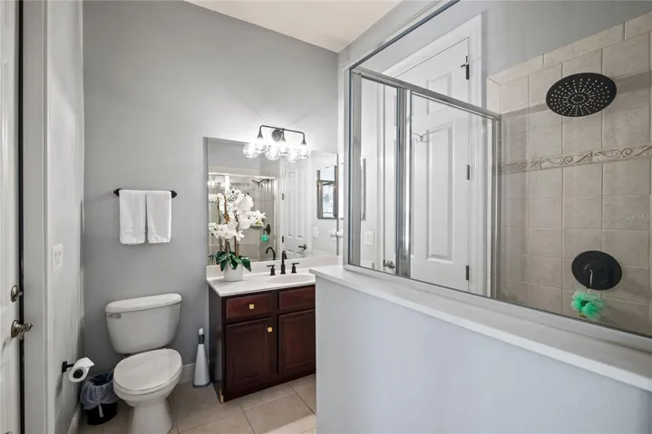 Bathroom 4 with entrance to the lovely backyard.