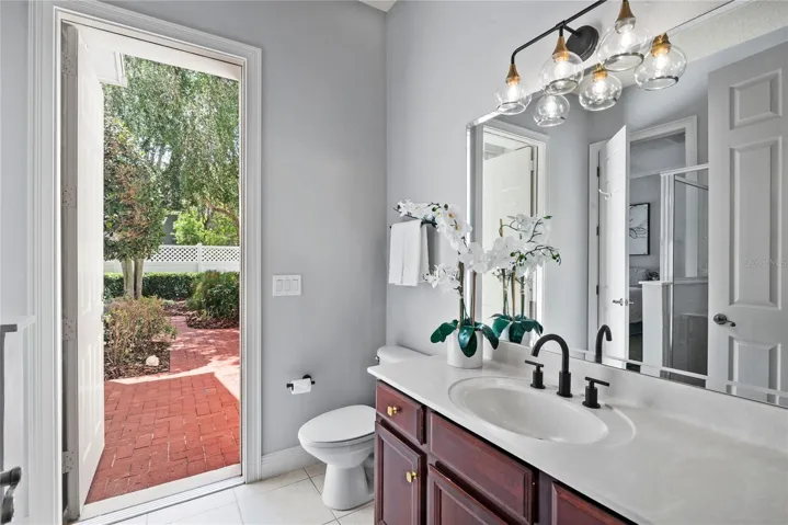 Bathroom 4 with entrance to the lovely backyard.