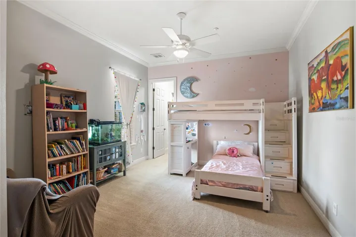 Bedroom 3 is large with natural lighting.