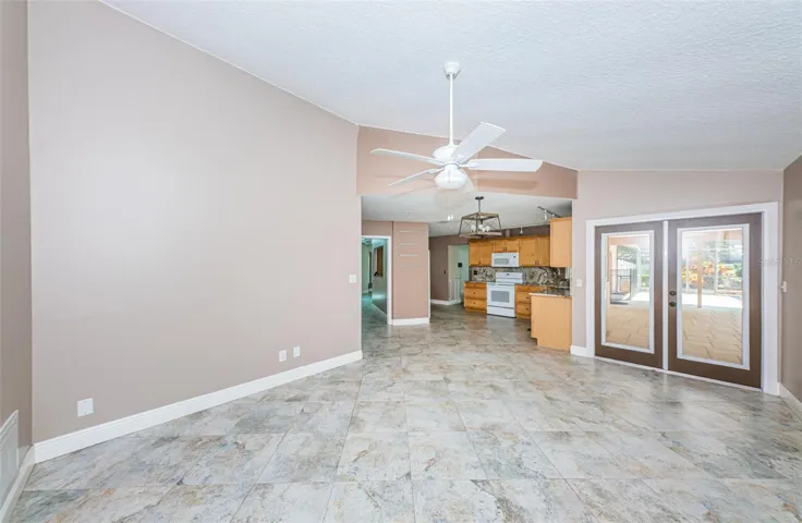 Family room is open to the kitchen & opens to lanai