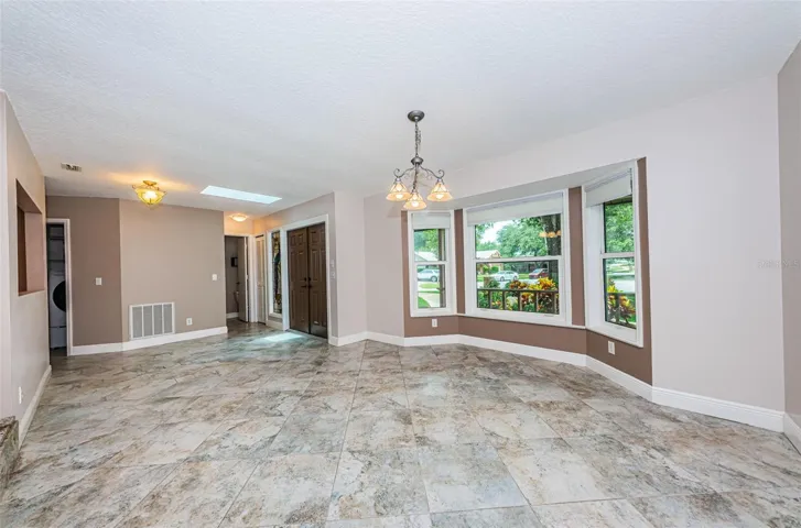 Tile throughout the home.  Formal dining with bayed window