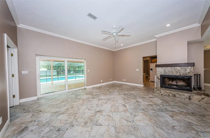 Formal living with wood burning fireplace