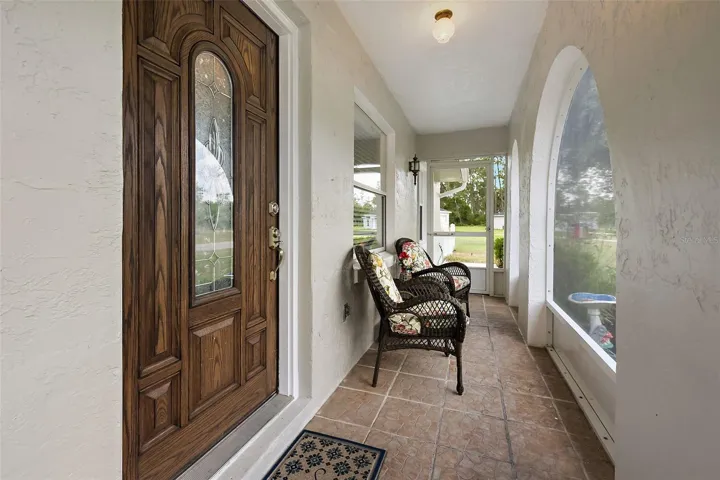Screened-in and covered front porch
