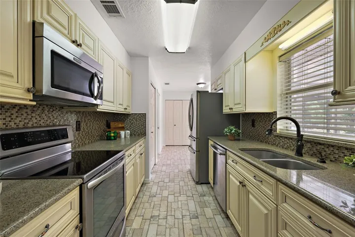 Remodeled Kitchen with Quartz and Stainless Steel