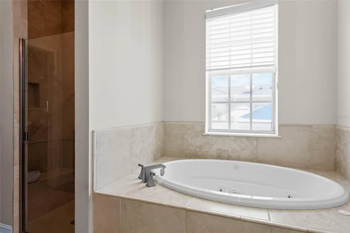 Jacuzzi tub in primary bathroom
