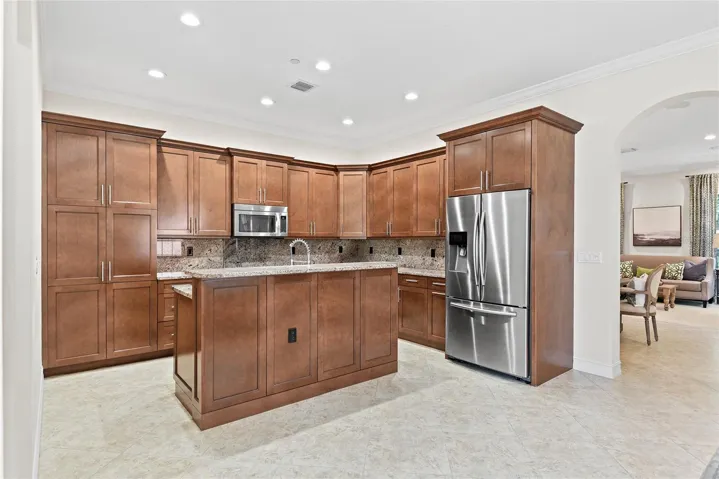 Beautiful wood cabinets with breakfast bar