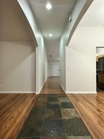 Front entry, form living and formal dining rooms