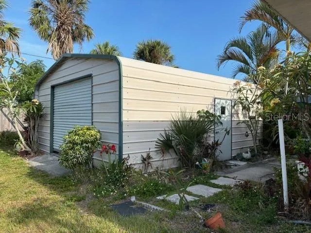 20x20 shed secured on cement slab with electric