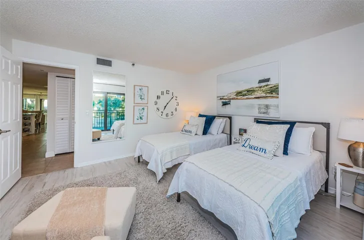 ..Guest Bedroom #2..  Looking In from Balcony.. Guest Bath is right outside Door to Right.