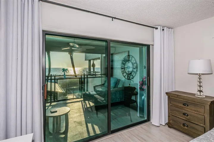 .. Master Bedroom Looking out Towards Gulf Front Balcony.