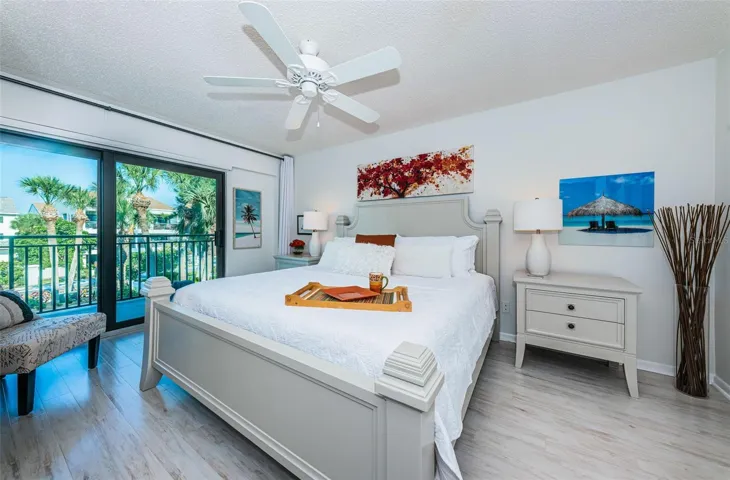 ..Primary Guest Bedroom - South Side With Balcony Access.. High Impact Sliders.. Shot #1