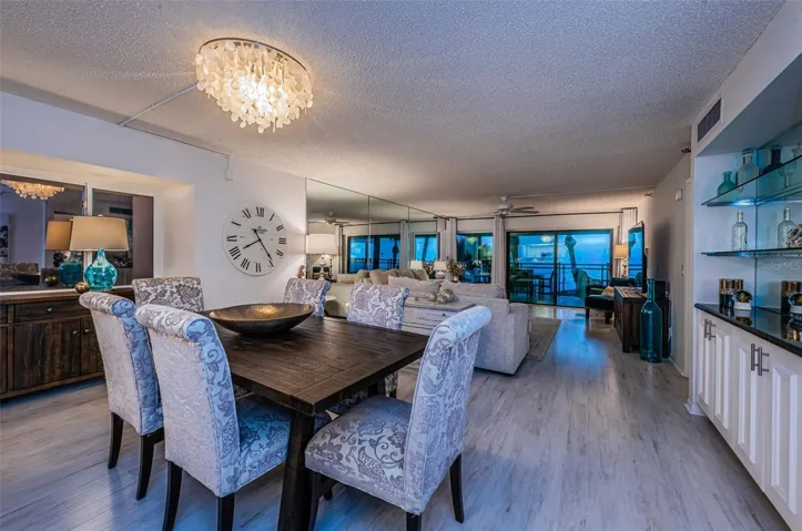 ... Great Room From Dining Area To Balcony Sliders..