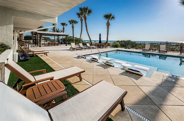 .... GULF FRONT.. POOL & LOUNGING AREA IS OVER 135 FEET LONG..