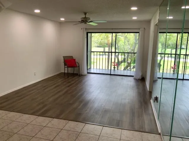 Living room with mirror wall