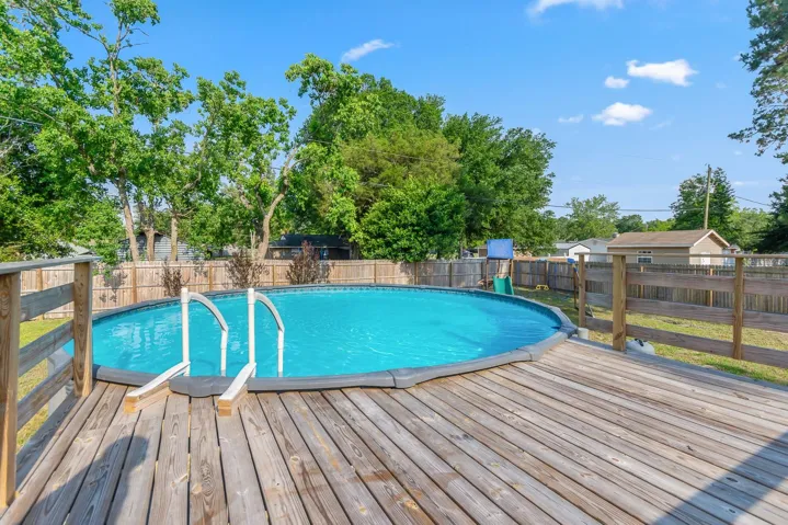 Above ground pool and deck