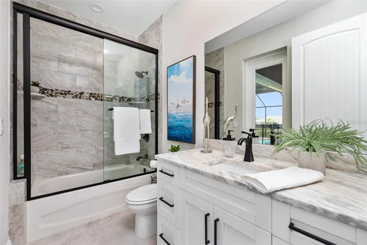 Guest/Pool Bath with glass shower doors