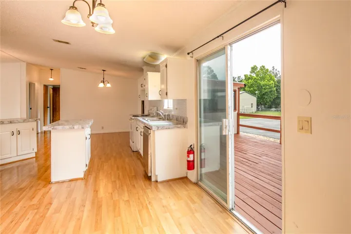 Sliding doors offer access to the back deck and lanai.