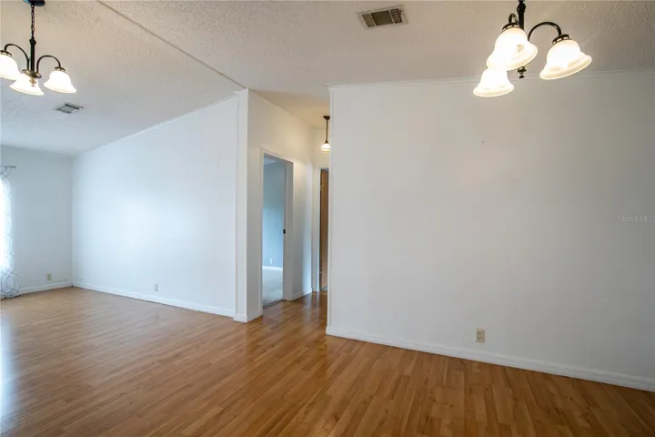 Hallway to guest bedrooms and bath.