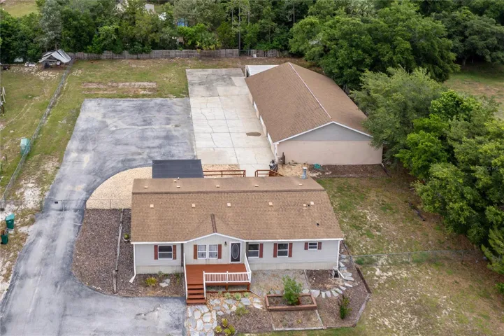 A 60x40 Block Garage is just one of three outbuildings on site.