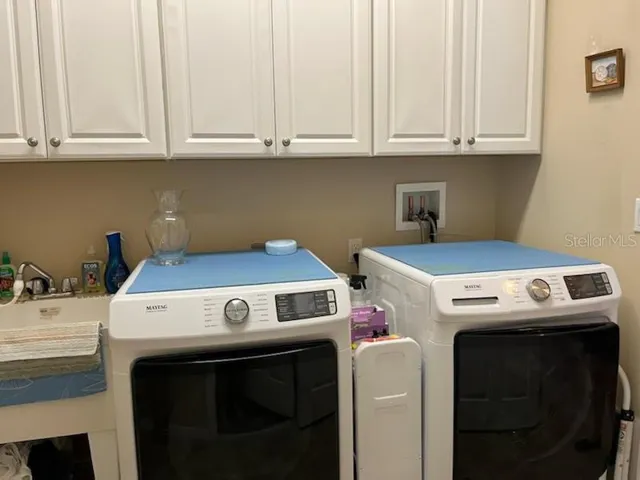 Lots of Cabinets in the Laundry room.