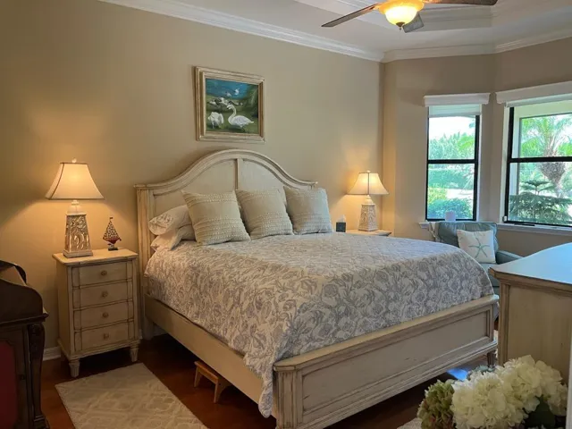 Primary Bedroom with Cherry hardwood floors.