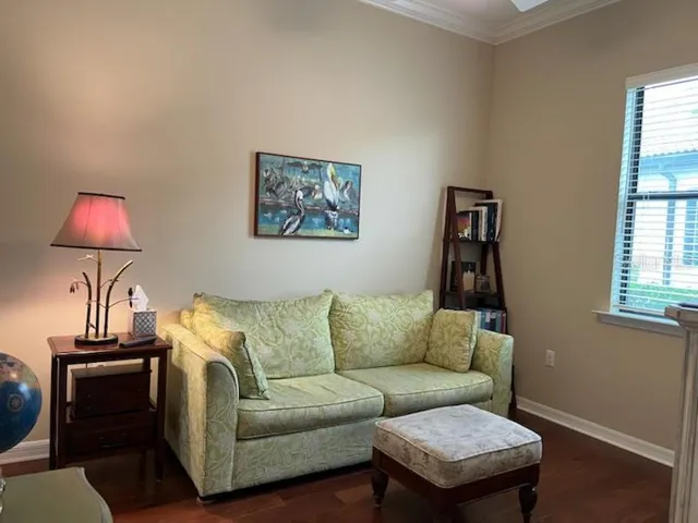 Third bedroom/den with Hickory hardwood floors.