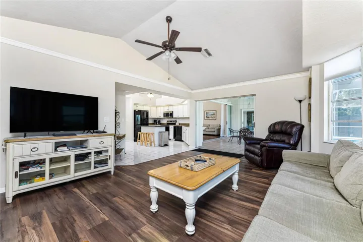 Family Room View To Kitchen, Florida Room and Living Room.