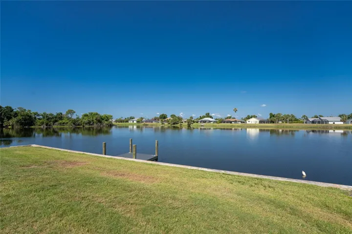 Beautiful View With Seawall And Dock.