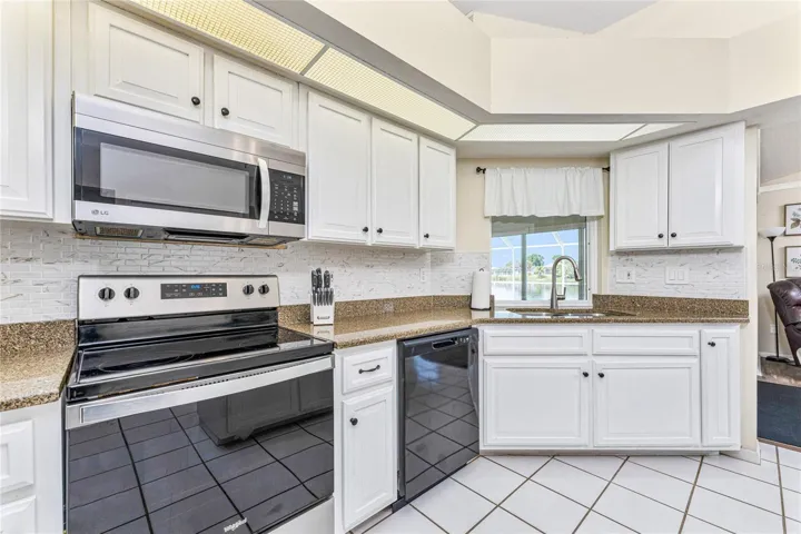 Beautiful Tile Back Splash And Granite Counter Tops!