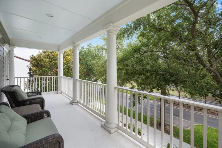 Balcony accessed by two of the three bedrooms upstairs.