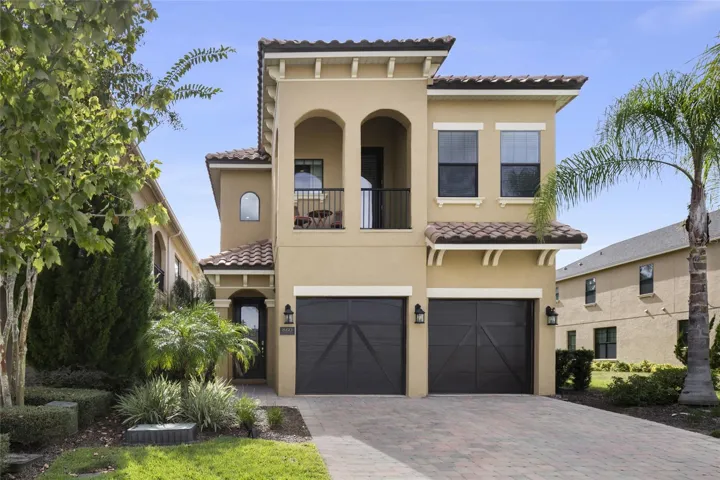 Front view with walk up covered patio