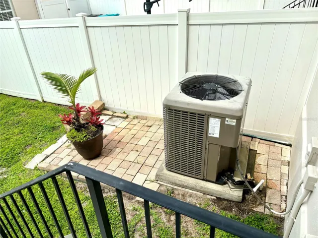yard and walk way to garage AC