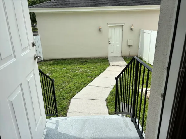yard and walk way to garage