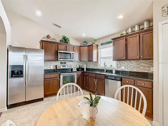 Large 11' x 14' kitchen offers lots of work space.